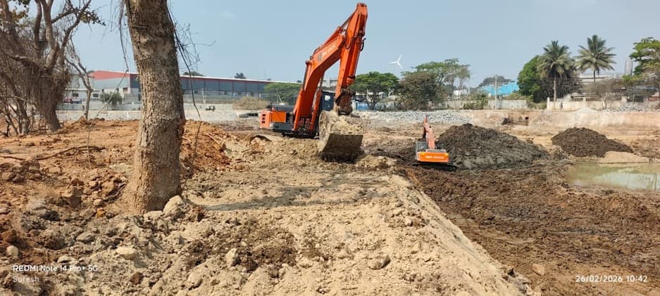 Krishnasagara lake development after work with excavator supporting channel shaping