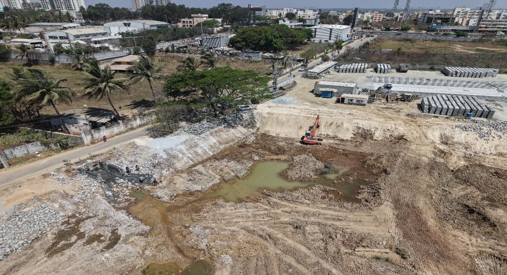 Krishnasagara lake before development with exposed lake bed and excavation work