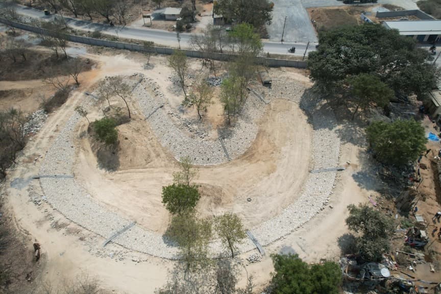 Panathur forest area site development aerial view with formed paths and stone edging